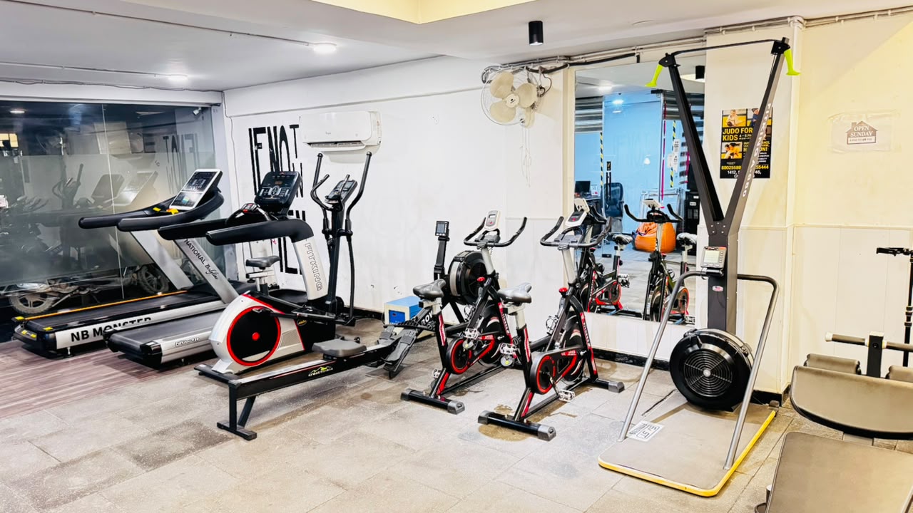 Cardio zone with treadmills and spin bikes
